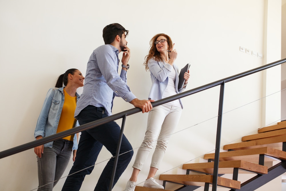 Estate Agent showing couple a house