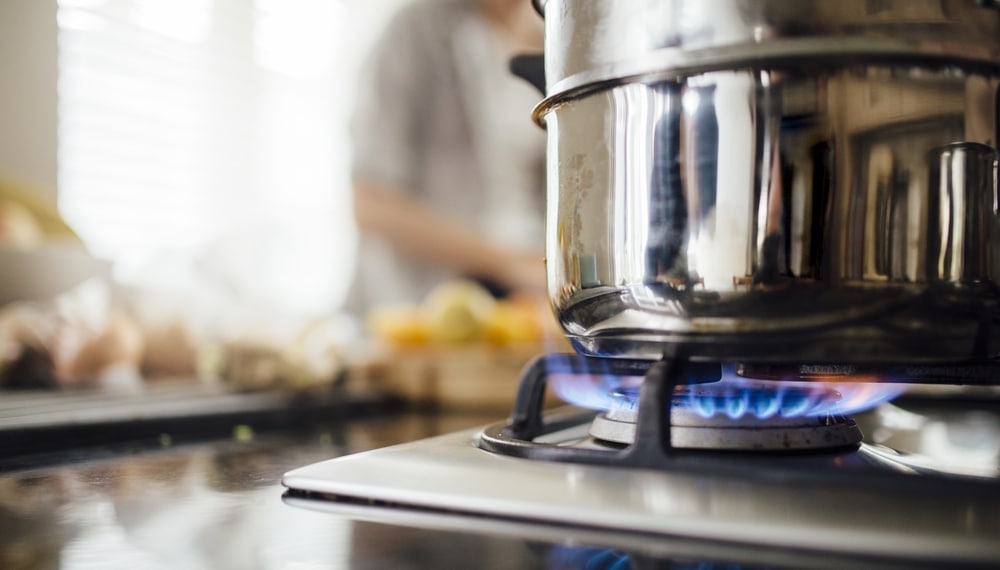 Gas hob with pot on it