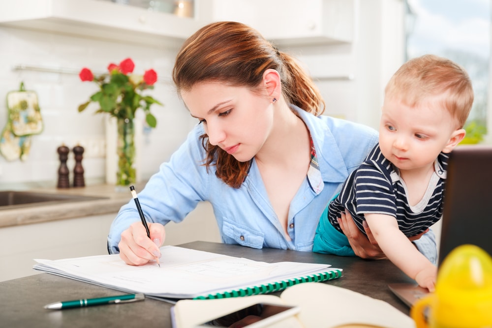 Young mother studying