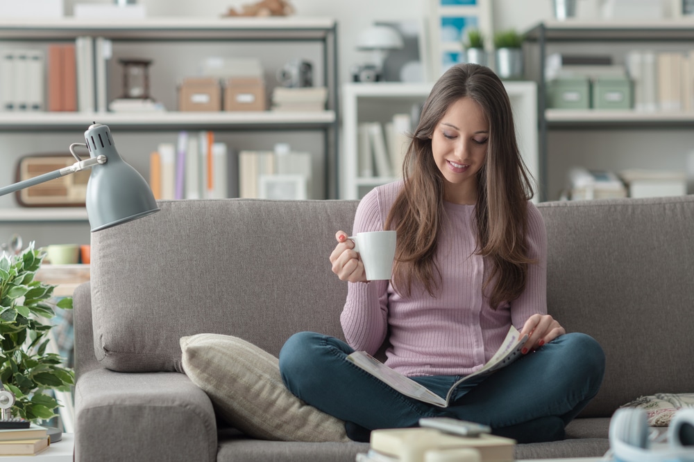 Young woman housesitting