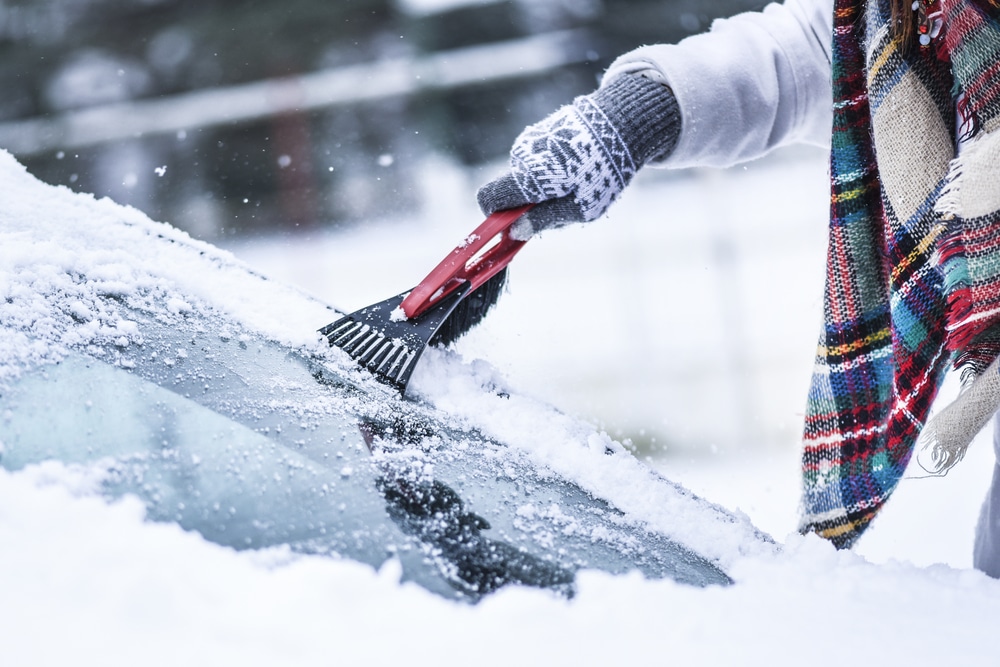 car covered in snow in winter